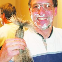 Middle school teacher Gary Weddle, 50, East Wenatchee, displays his cut beard while shaving the remaining stubble the evening of May 1. He completed a vow made nearly 10 years ago not to shave until Osama bin Laden was captured or proven killed.