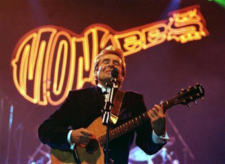 Lead singer of the sixties rock band The Monkees, Davy Jones, sings on stage at the Newcastle Arena March 7 1997. Credit: Reuters/Dan Chung