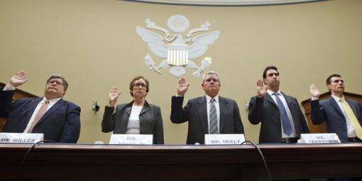 April 16, 2012: Witnesses prepare to testify before a House committee on General Services Administration spending. Being sworn in, from left, are: GSA Inspector General Brian Miller; former GSA Administrator Martha Johnson; Jeff Neely, former regional commissioner of the Public Buildings Service, Pacific Rim Region; GSA Chief of Staff Michael Robertson; and David Foley, deputy commissioner of the GSA Public Buildings Service. (AP)