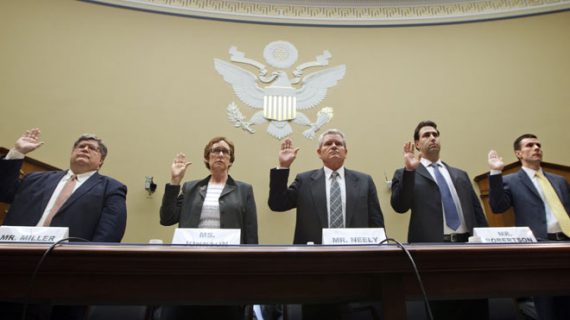 April 16, 2012: Witnesses prepare to testify before a House committee on General Services Administration spending. Being sworn in, from left, are: GSA Inspector General Brian Miller; former GSA Administrator Martha Johnson; Jeff Neely, former regional commissioner of the Public Buildings Service, Pacific Rim Region; GSA Chief of Staff Michael Robertson; and David Foley, deputy commissioner of the GSA Public Buildings Service. (AP)  