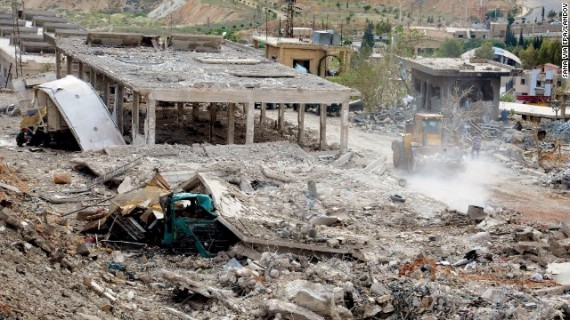 A photo released by the Syrian Arab News Agency shows destruction from what is said was bomb attack in the Al-Hama area of Damascus on Sunday, May 5. According to the Syrian government, Israel launched an attack on a research center in the Damascus suburbs early Sunday.