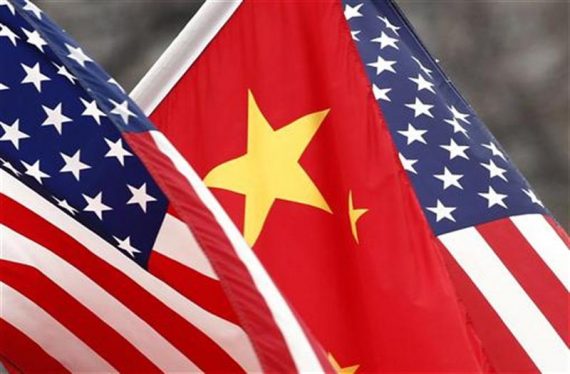 Chinese and U.S. flags fly along Pennsylvania Avenue outside the White House in Washington