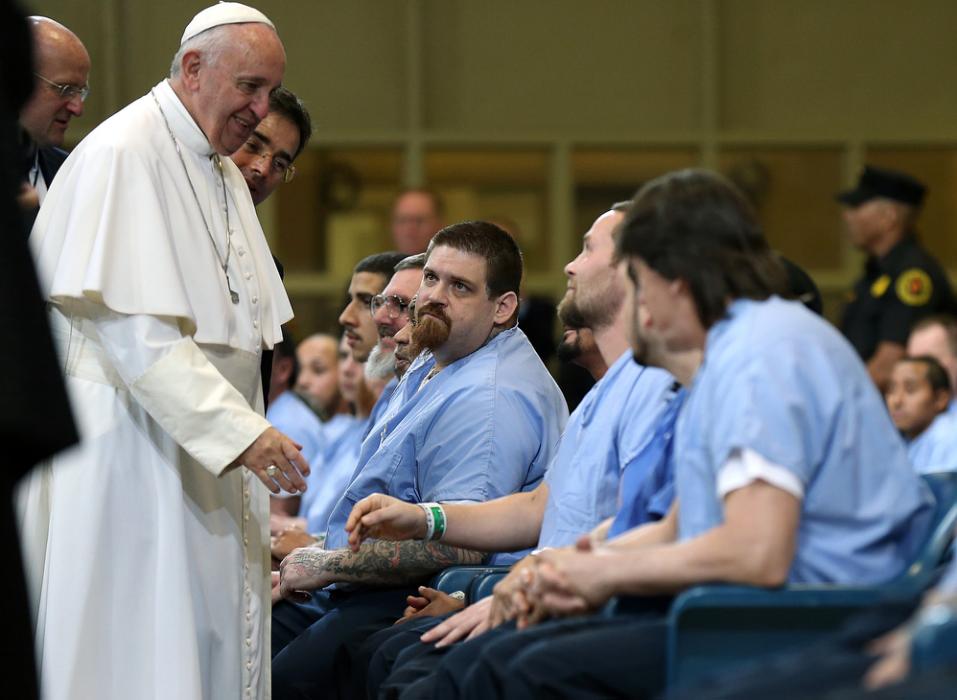 Pope Francis greets inmates during his visit to Curran Fromhold Correctional Facility in Philadelphia, Sunday, Sept. 27, 2015. (David Maialetti/The Philadelphia Inquirer, Pool)