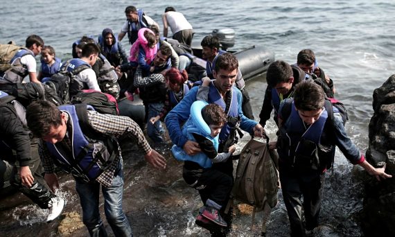 Syrian Refugees Coming Ashore In Greece