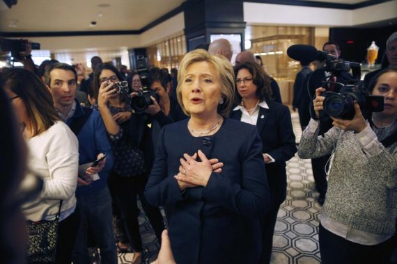 Democratic presidential candidate Hillary Clinton reacts to meeting a couple at Harrah's Las Vegas, Saturday, Feb. 13, 2016, in Las Vegas. (AP Photo/John Locher)