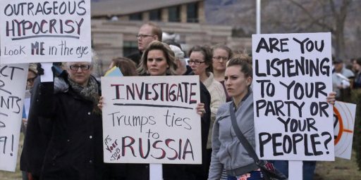 Signs Of An Anti-Trump 'Tea Party' At Congressional Town Halls