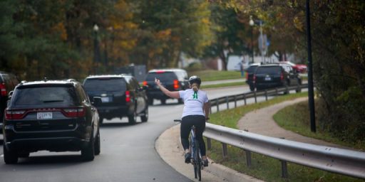 Woman Fired After Flipping The Bird To Trump's Motorcade Sues Former Employer