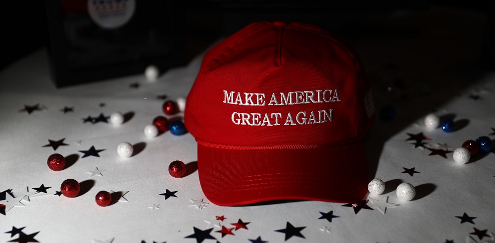 Kanye West teams a MAGA hat with a Colin Kaepernick shirt