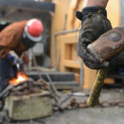 photo of working, person, military, construction, cutting, team, helmet, build, labor, job, workers, laborer, task, construction worker, sledge hammer