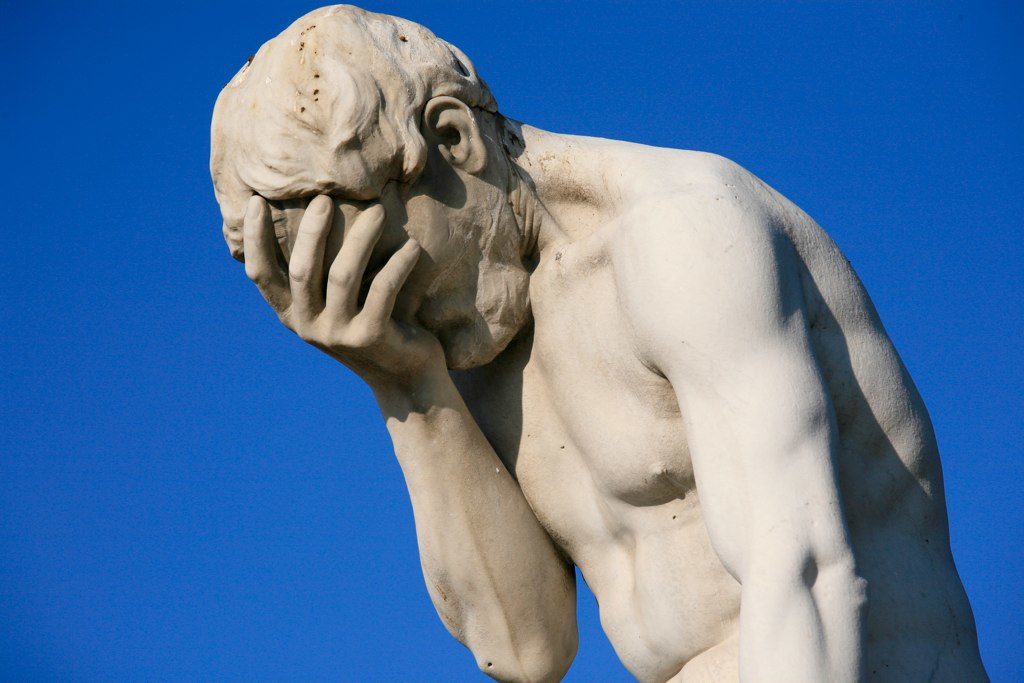 thinker statue facepalm