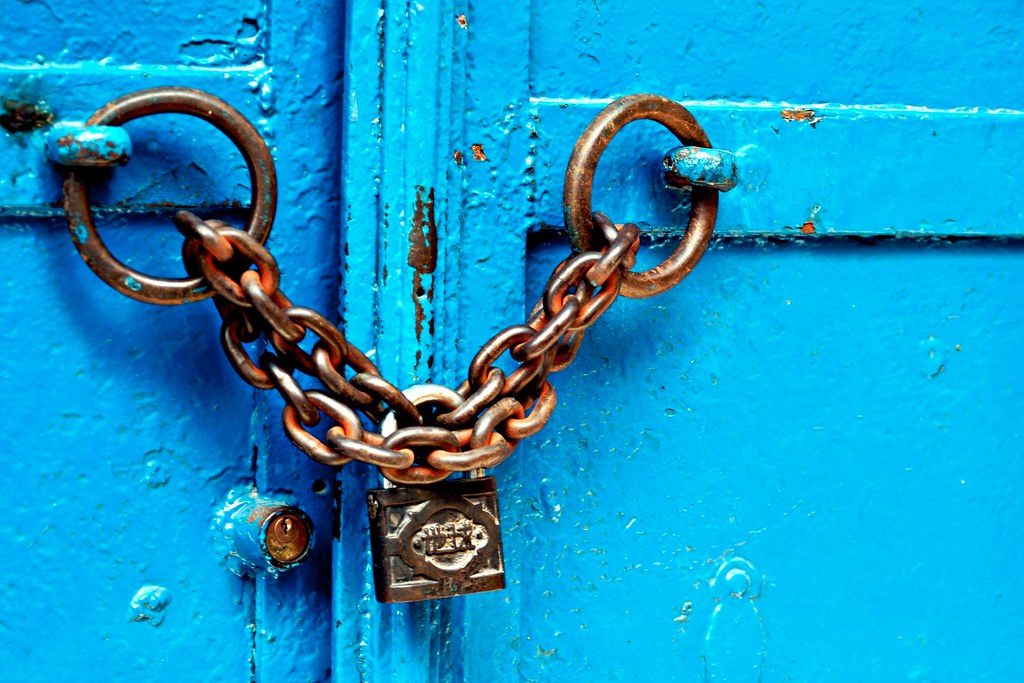 blue door chained and locked