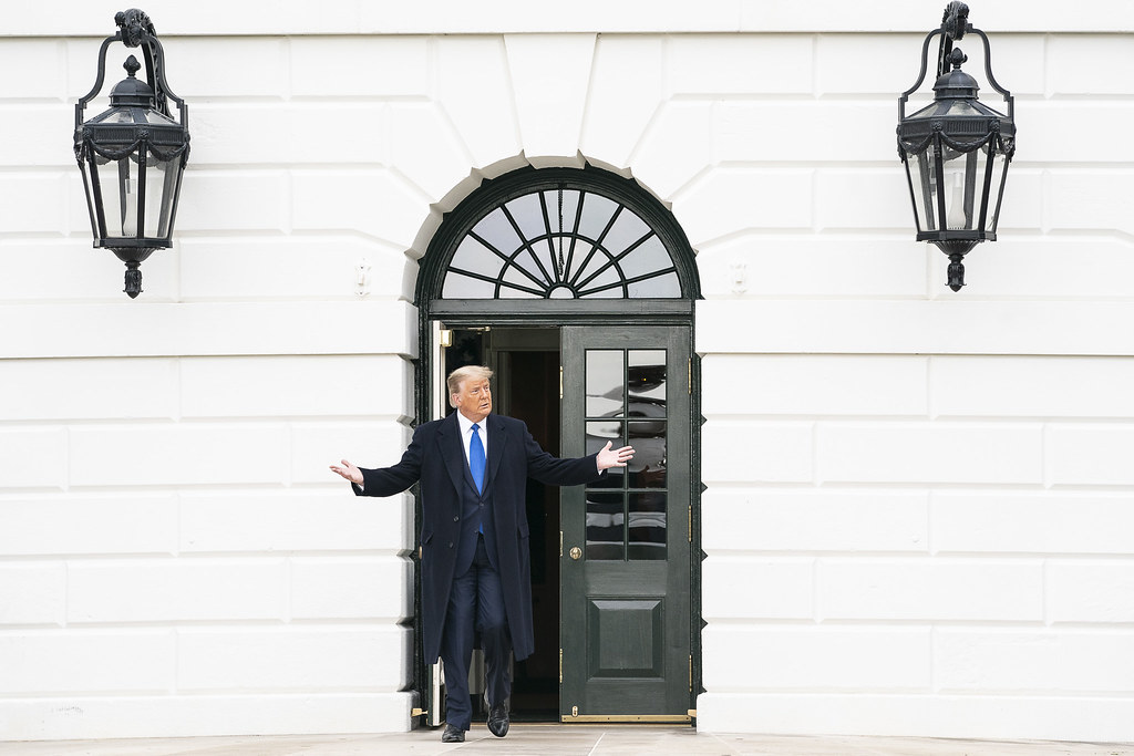 President Donald J. Trump greets guests on the South Lawn of the White House Tuesday, Oct. 27, 2020, prior to boarding Marine One en route to Joint Base Andrews, Md. to begin his trip to Michigan, Wisconsin, Nebraska and Nevada. (Official White House Photo by Joyce N. Boghosian)