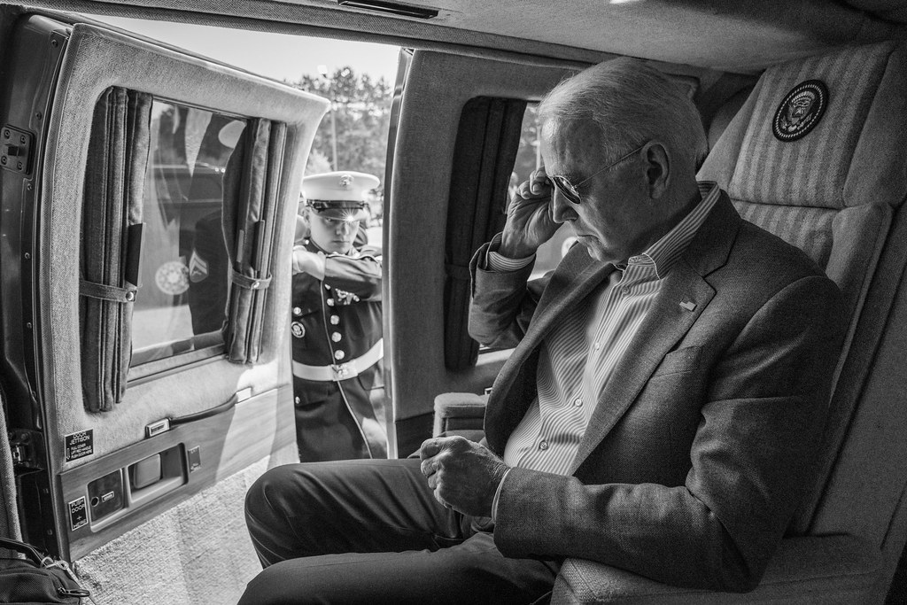 A U.S. Marine opens the door as President Joe Biden prepares to disembark Marine One, Saturday, July 3, 2021, at Antrim County Airport in Bellaire, Michigan. (Official White House Photo by Adam Schultz)