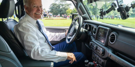 President Joe Biden drives a Jeep Wrangler Rubicon during a clean cars event, Thursday, August 5, 2021, on the South Lawn Driveway of the White House.