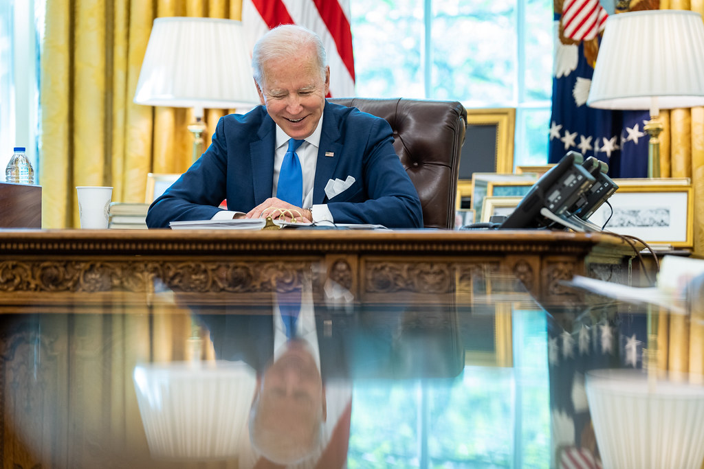 President Joe Biden talks on the phone with House Speaker Nancy Pelosi (D-Calif.) and Majority Leader Chuck Schumer (D-N.Y.), Monday, May 9, 2022, in the Oval Office. (Official White House Photo by Adam Schultz)