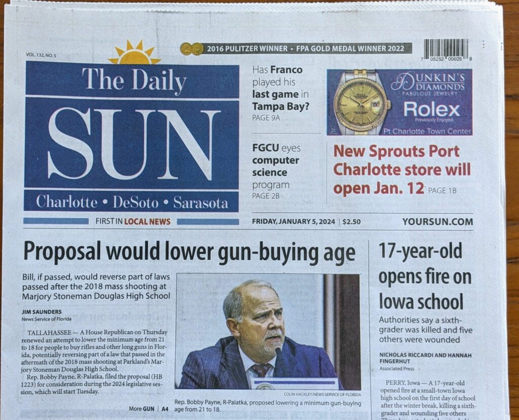 [Sarasota The Daily Sun front page from 1/5/24 with two headlines: - Proposal would lower gun-buying age and -17 year old opens fire on an Iowa School